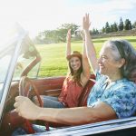 mother-and-daughter-driving-in-classic-convertible-royalty-free-image-533766347-1556827165